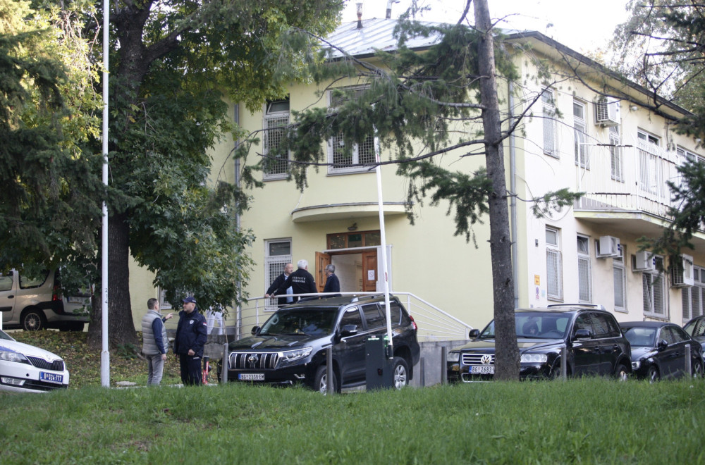 Human shields, a screen, a black jeep, a hood, a cap and an ambulance